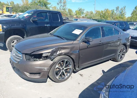 2015 Ford Taurus Sel z USA, uszkodzony, nr VIN 1FAHP2H89FG174627